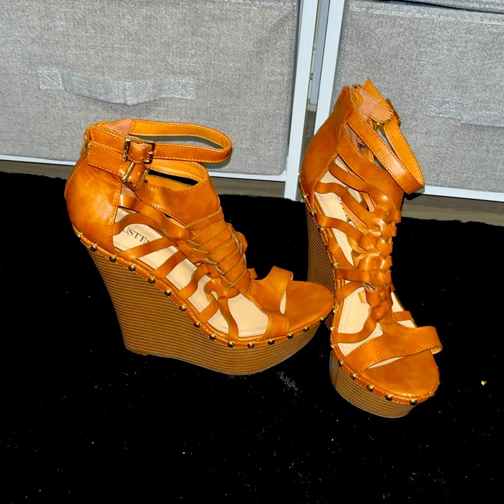 Wedge tan color heel, Never worn